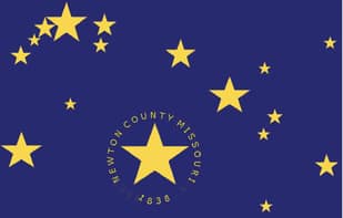 The Newton County flag: gold stars on an Old Glory Blue field, the largest star ringed by the words Newton County Missouri 1838