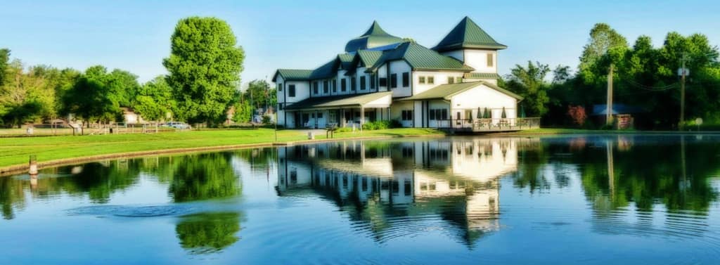 The visitor center and pond at the Neosho National Fish Hatchery